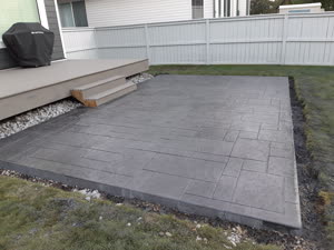 Stamped Concrete Patio With Deck Calgary